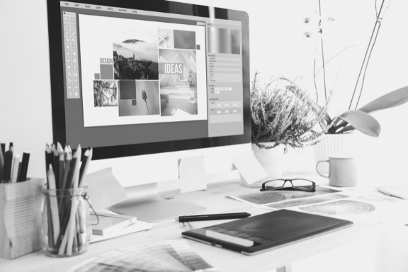 Computer with graphic design desktop